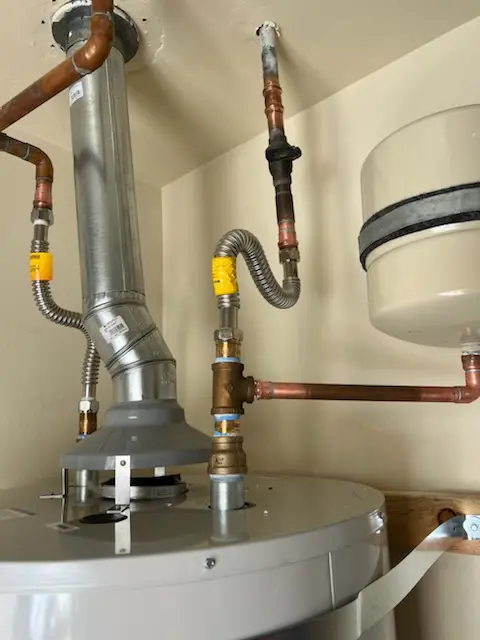 Water heater installation and plumbing repair in Cecil Manor